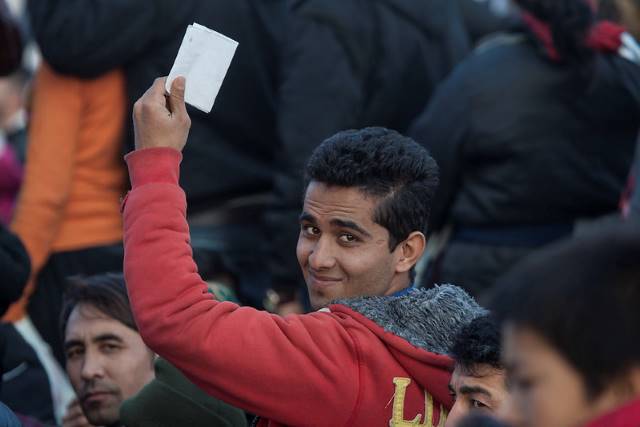 Greece's Refugee COVID-19 Vaccination